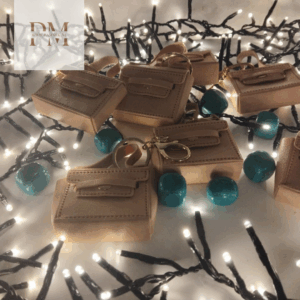 Sleutelhanger roze tas met turquoise parel